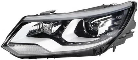 VW Основна фара лів. TIGUAN 07- HELLA 1ZS 010 748-311